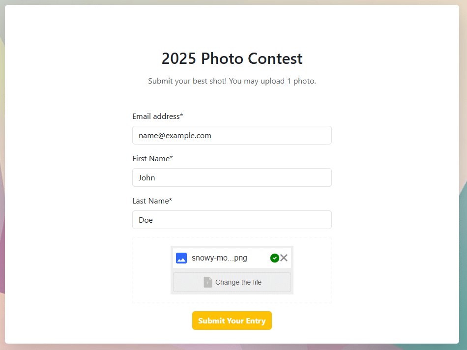 An image of the photo contest site UI with the mini file picker. In it, a file has been uploaded to the picker. The option to delete the file or change the file is present. The file name is also present.